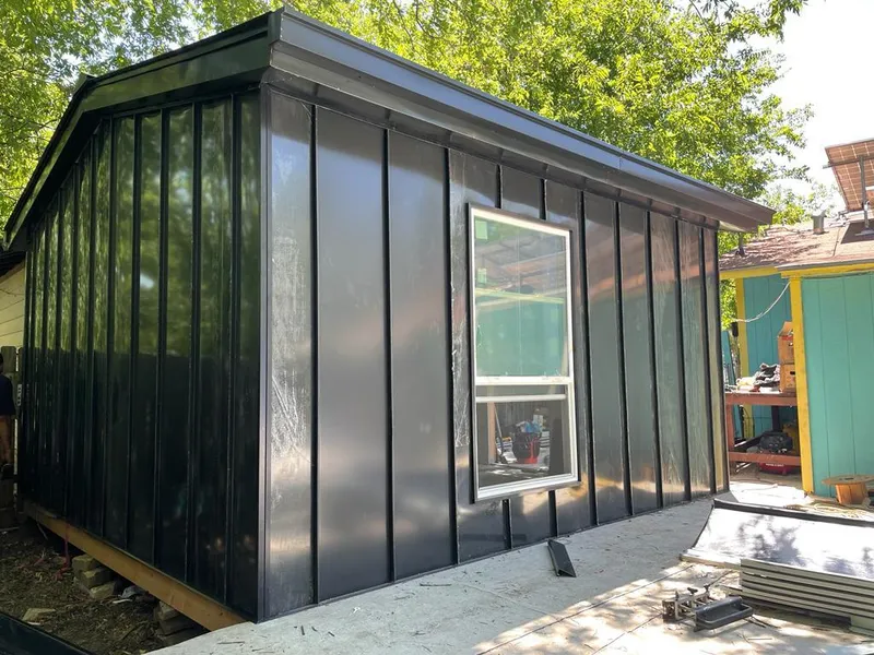 Black standing seam metal wall panels for Metal Roof Installation in Fruitland