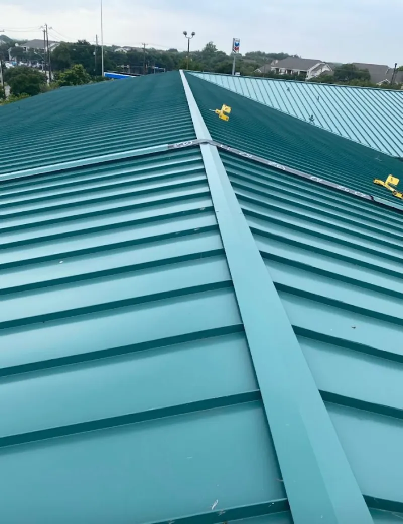 Green commercial metal roof ridge and valley for Metal Roof Repair in Fruitland